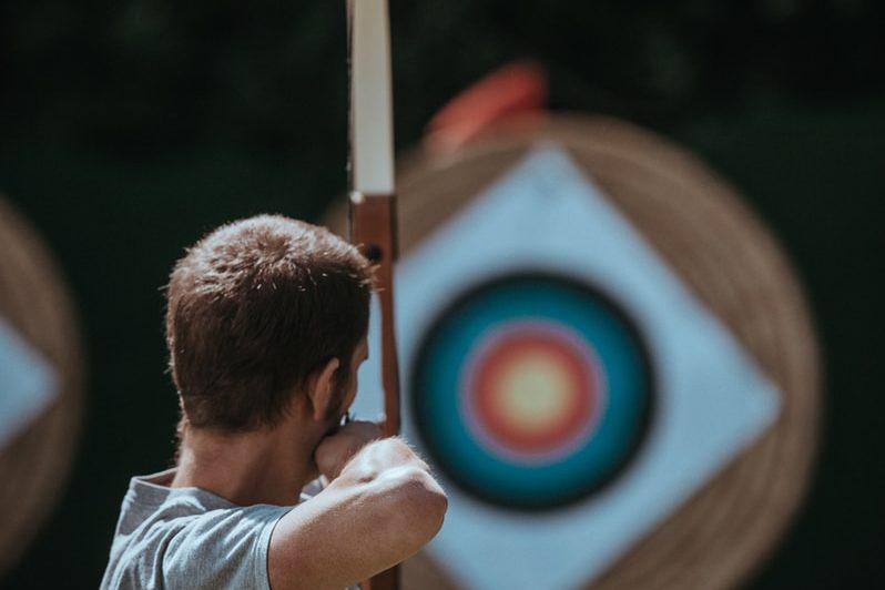 white and brown composite bow